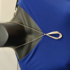 Sparkling silver tone pendant and chain